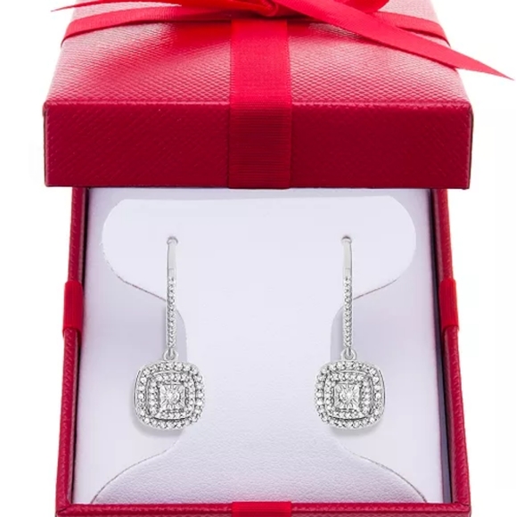 700$ 1/2 Kt Diamond Sterling Silver Earrings.